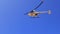 Helicopter flies over the beach