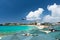 Helicopter flies over the beach, Maho bay, Caribbean