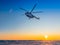 Helicopter flight in the northern sky during a polar winter day.