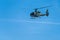 Helicopter flying over the Kotor Bay in winter