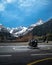 Helicopter landed on the base on the helipad in the mountains