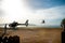 Helicopter landing on a helipad on a tropical island