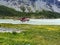 The helicopter lands on the shore of Akkem lake in the Altai mountains near Belukha mountain.