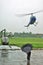 Helicopter launch under a rain