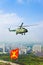 Helicopter with military flag over Moscow