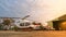 Helicopter in the parking lot or runway waiting for maintenance with sunrise background,twilight helicopter on the helipad