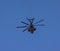 Helicopter with rotator blades in flight over Berkeley California