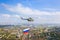 Helicopter with russian flag over Moscow at parade