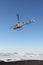 Helicopter taking off in Antarctica