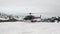 Helipad on snow mountain panorama and helicopter in New Zealand.
