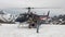 Helipad on snow mountain panorama and helicopter in New Zealand.