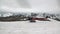 Helipad on snow mountain panorama and helicopter in New Zealand.