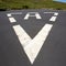 Heliport triangle white soil painted sign