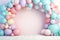 Helium balloons arch on pastel background. Wall decorated with colorful balloons for birthday party, baby shower, wedding. Mockup