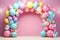 Helium balloons arch on pastel background. Wall decorated with colorful balloons for birthday party, baby shower, wedding. Mockup