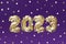 Helium golden balloon number of year 2023. Glowing festive garland with bokeh. Happy New Year greeting card