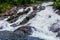 Hellesyltfossen waterfall in area Geirangerfjord