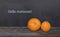 Hello Autumn greeting text with colorful pumpkins Blackboard background