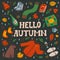 Hello autumn. Set of autumn essentials on dark background. Warm clothes, berries and leaves, etc. Collection of fall