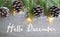 Hello December.Christmas decoration on old wooden background.Winter holidays concept.