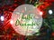 Hello December text on a blurred Christmas tree with garland lights background.Winter holidays concept.