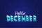 Hello December winter font with white snow on top and snowflakes around on night dark blue background for Christmas and New year