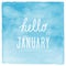 Hello January text with blue watercolor background