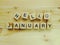 Hello january wooden block alphabet letters on wooden background