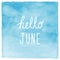 Hello June text with blue watercolor background