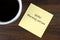 Hello Morning Person text on adhesive note with a cup of coffee