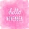 Hello November greeting on abstract pink watercolor background