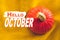 hello october text orange pumpkin on yellow cloth texture