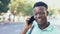Hello, phone call and black man in a city walking, talking and happy while discussing negotiation. Smartphone