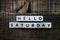 Hello Saturday alphabet letter on wooden background