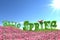 Hello Spring text on floral meadow