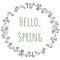 Hello spring text in wreath of snowdrops ornament. Beginning of spring holiday