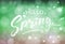 Hello Spring welcome sign. Vector typography in fresh colors for your design. Vintage lettering on blurred bokeh green background