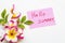 Hello summer message card handwriting with colorful flowers frangipani arrangement flat lay style