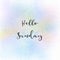 Hello Sunday text on pastel watercolor background