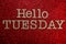 Hello Tuesday alphabet letter on red glitter background