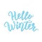 Hello winter. Blue Hand lettering quote logo with frozen texture. Brush Calligraphic design. Vector illustration.