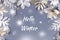 Hello Winter greeting card with golden and silver leaves with snow falling.