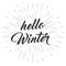 Hello winter text. Hand lettering at cute background. Vector card design with custom calligraphy.