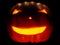 Helloween Pumpkin illuminated on black background. 3d illustration