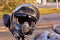 Helmet on damaged in a accident motorbike and a car