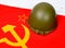 Helmet on the flag of the Soviet Union
