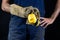 Helmet held by a construction worker. Protective clothing for ma