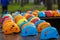 Helmets for rock climbers, arranged in rows