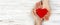 Help, Heart in Hand on wood background. Valentine day concept. banner for advertising and design, promo top view with copy space