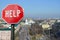 Help stop sign with view of Kyiv, Ukraine